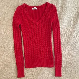 Red V-neck sweater